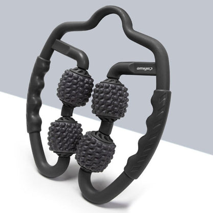 Black handheld massager with textured nodes on a light gray background