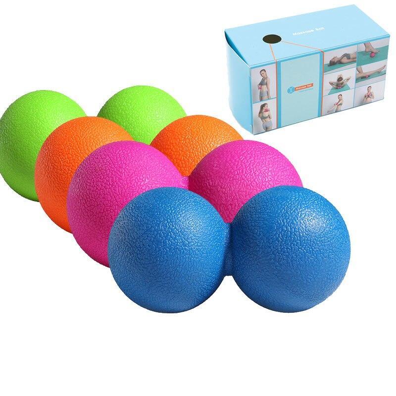 Colorful massage balls with a packaging box in the background