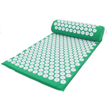Green acupressure mat with white nodes and matching roller on a white background