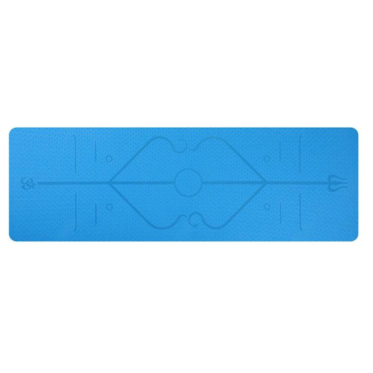 Blue yoga mat with geometric design on a white background