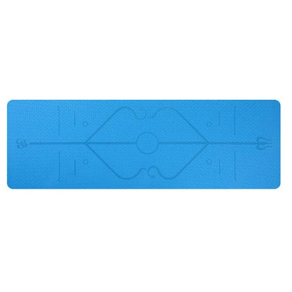 Blue yoga mat with geometric design on a white background