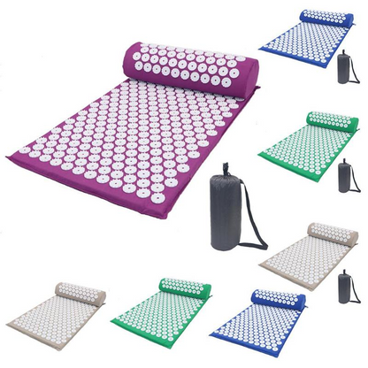 Acupressure mats in various colors with carrying bags on a white background