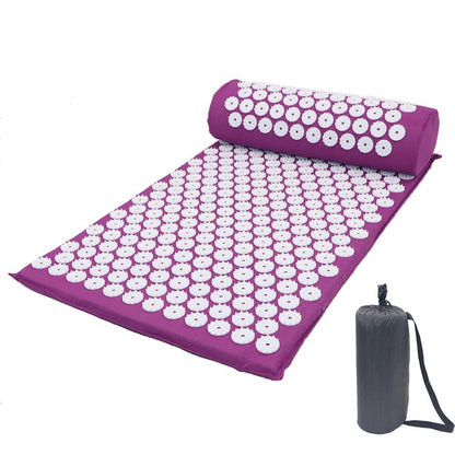 Acupressure mat and pillow set with carrying bag on a white background