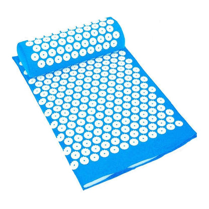 Blue acupressure mat with white nodes on a white background