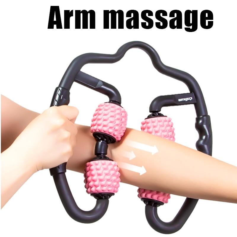 Hand using an arm massage tool with pink nodes on a white background