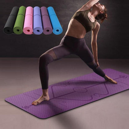 Woman practicing yoga on a purple mat with additional mats in the background.