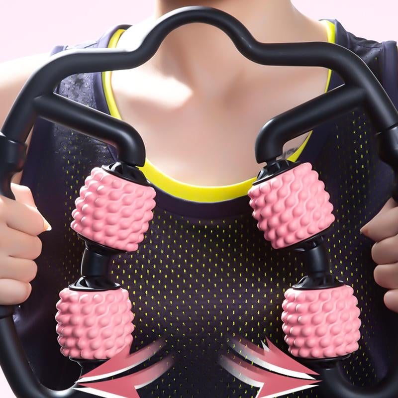 Person using a pink and black massage tool with textured handles.