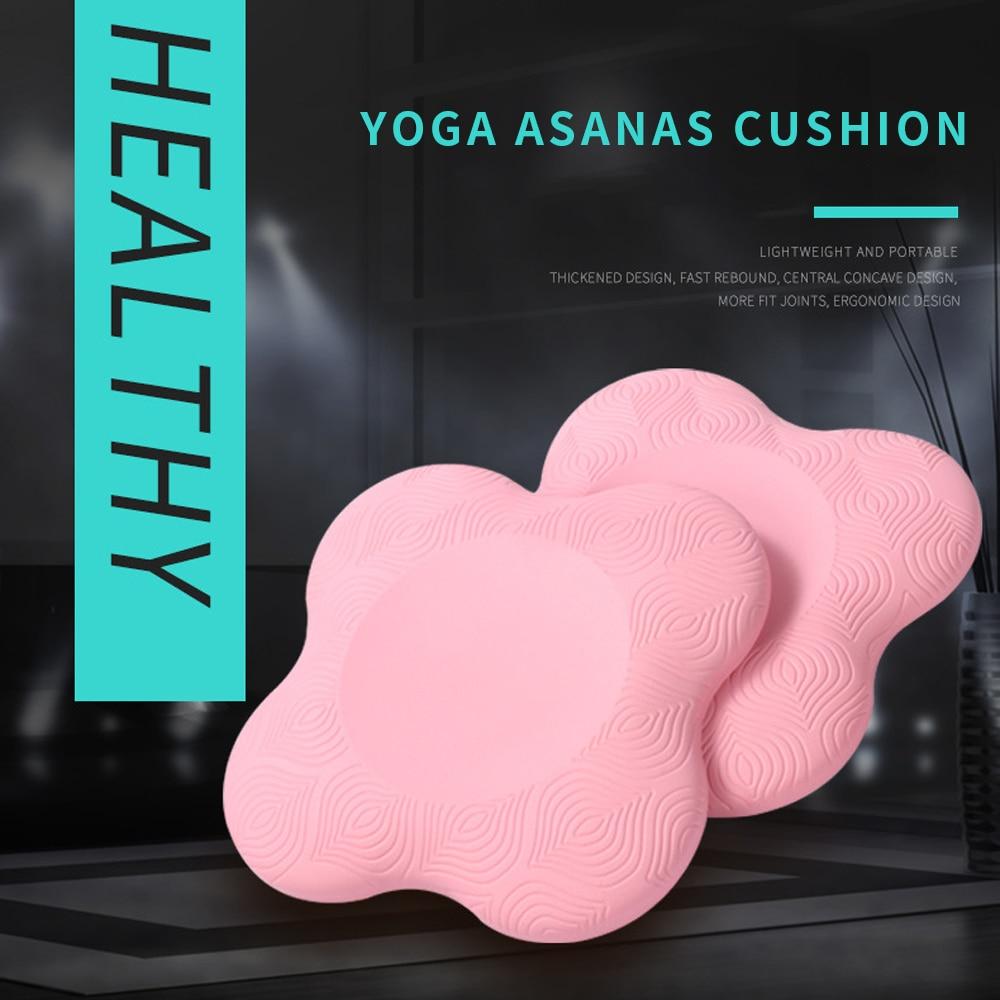 Pink yoga asanas cushion with 'HEALTHY' and 'YOGA ASANAS CUSHION' text on a dark background