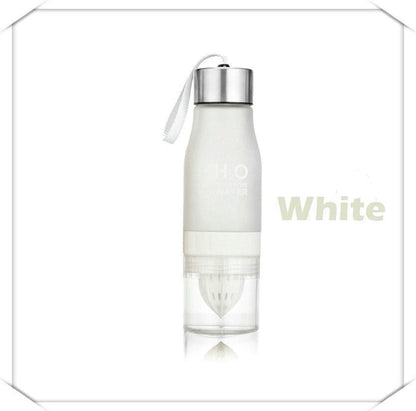 Clear water bottle with a silver cap on a white background