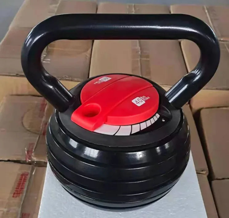Black kettlebell with a red target on a cardboard box background