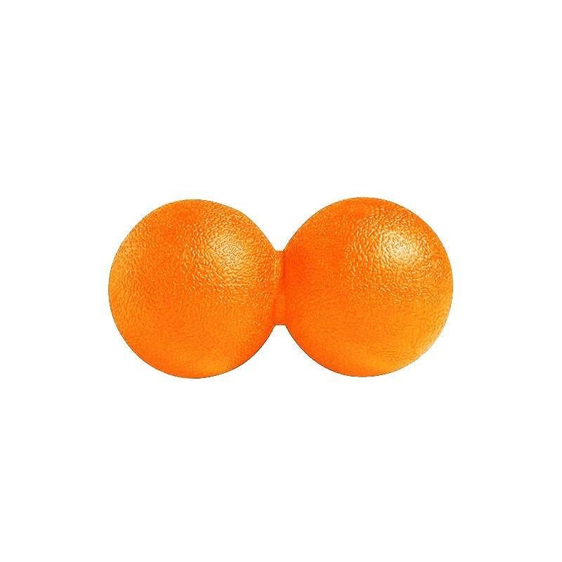 Two orange massage balls on a white background