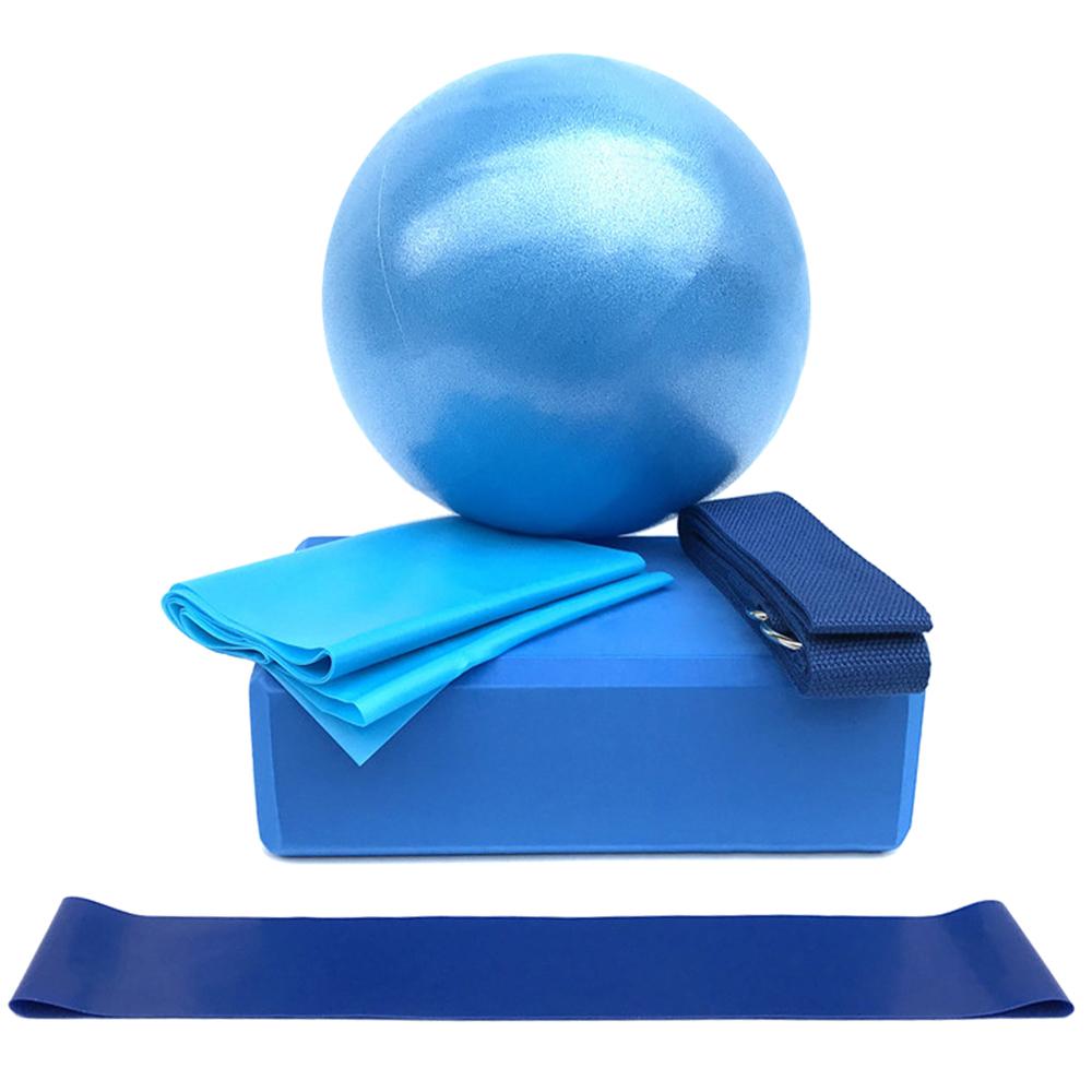 Blue exercise ball, block, and resistance band on a white background