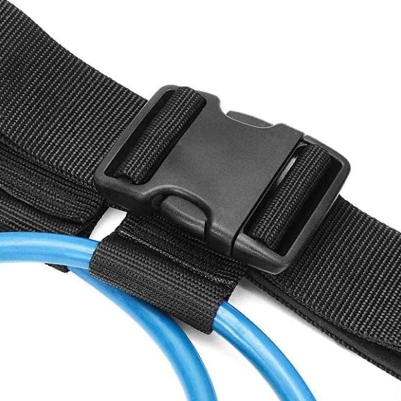 Black belt with a buckle holding blue cables on a white background