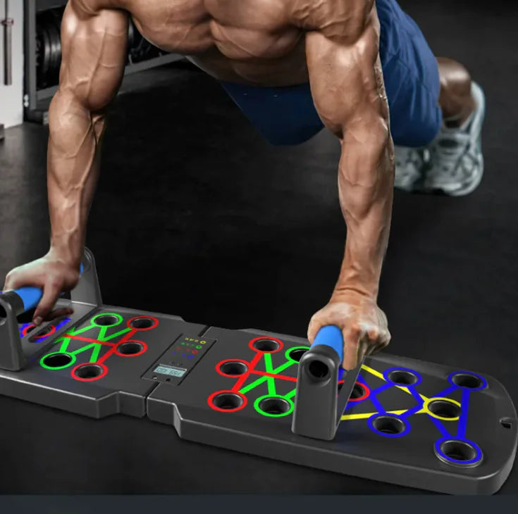 Person doing push-ups on a colorful fitness board in a gym setting
