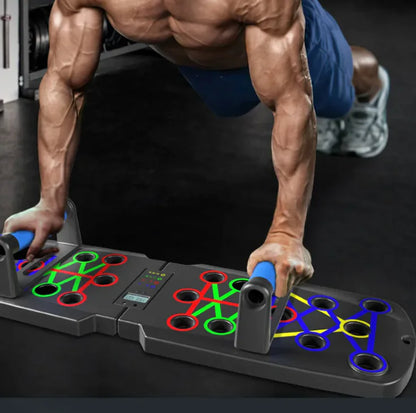 Person doing push-ups on a colorful fitness board in a gym setting